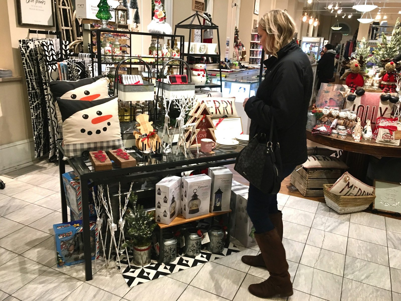 Woman shopping local for Christmas to support local retailers
